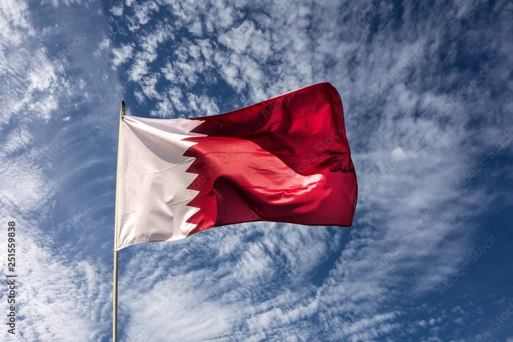 flag of the country qatar waving in the wind stockpack adobe stock 1| وظائف PayTech Group لجميع الجنسيات في قطر