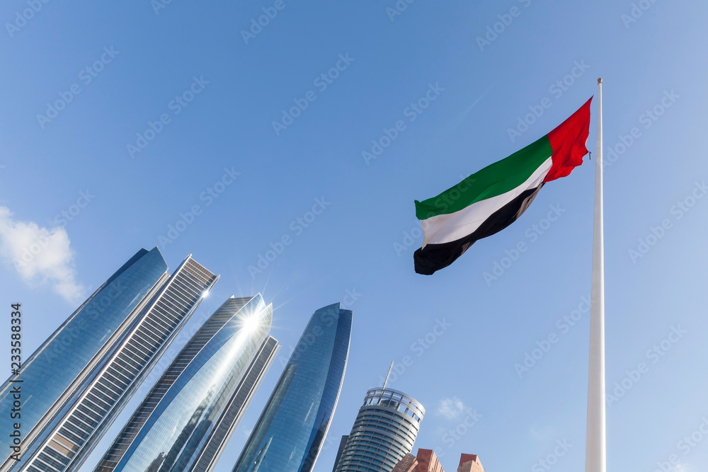uae flag waving in the sky national symbol of uae stockpack adobe stock| وظائف شرطة دبي لحملة الثانوية برواتب مجزية في الامارات